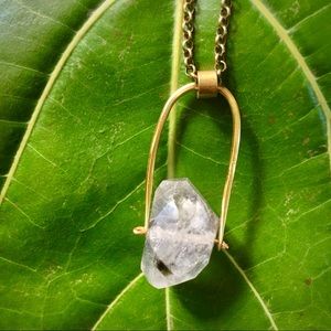 Brass necklace with crystal pendant